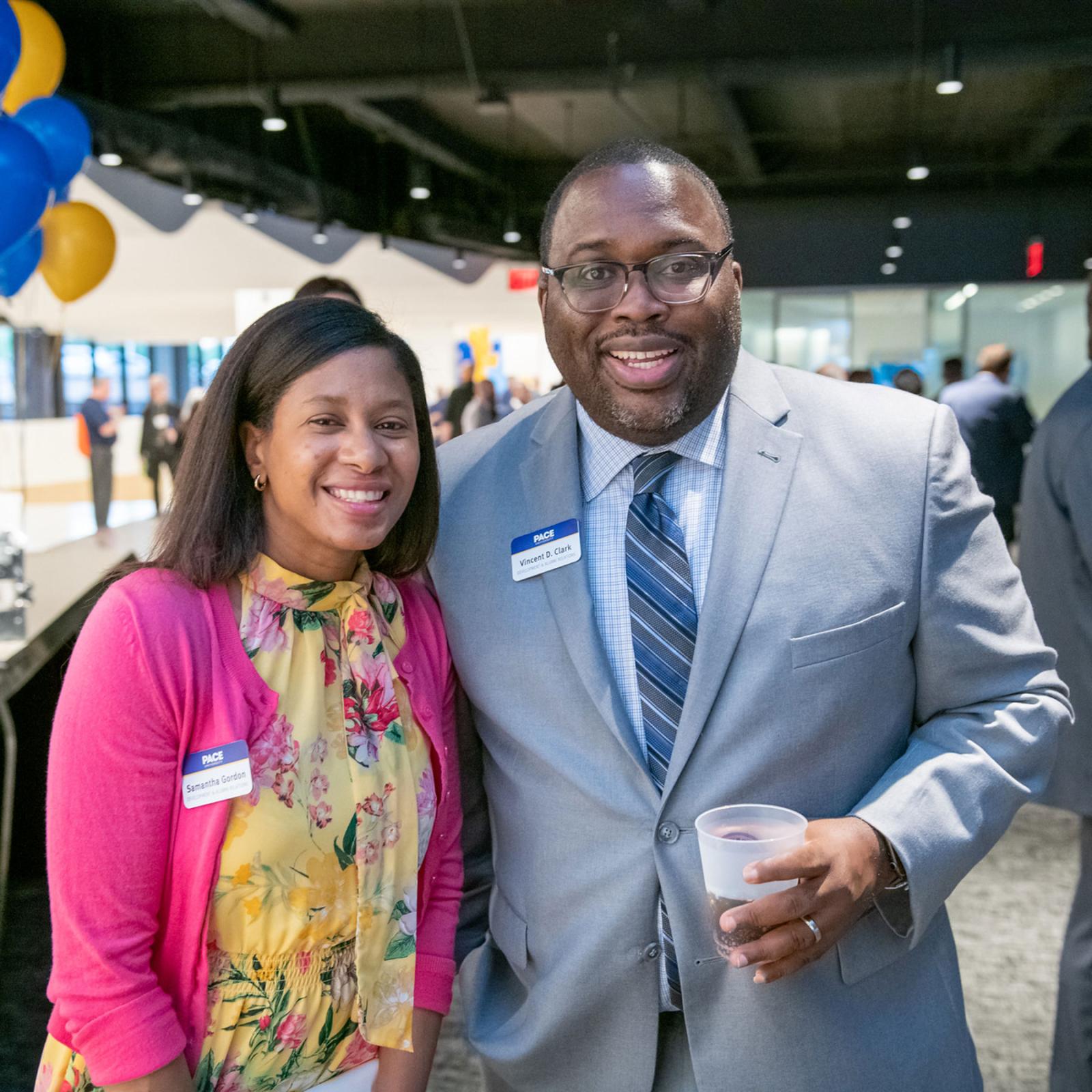 Two Pace University alumni enjoying their 2023 Reunion.