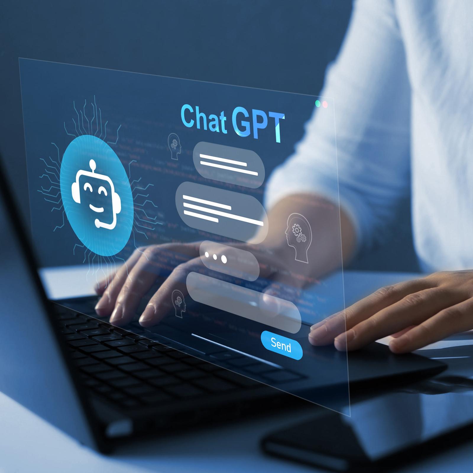 Hands at a computer typing, an overlay shows an interaction with ChatGPT