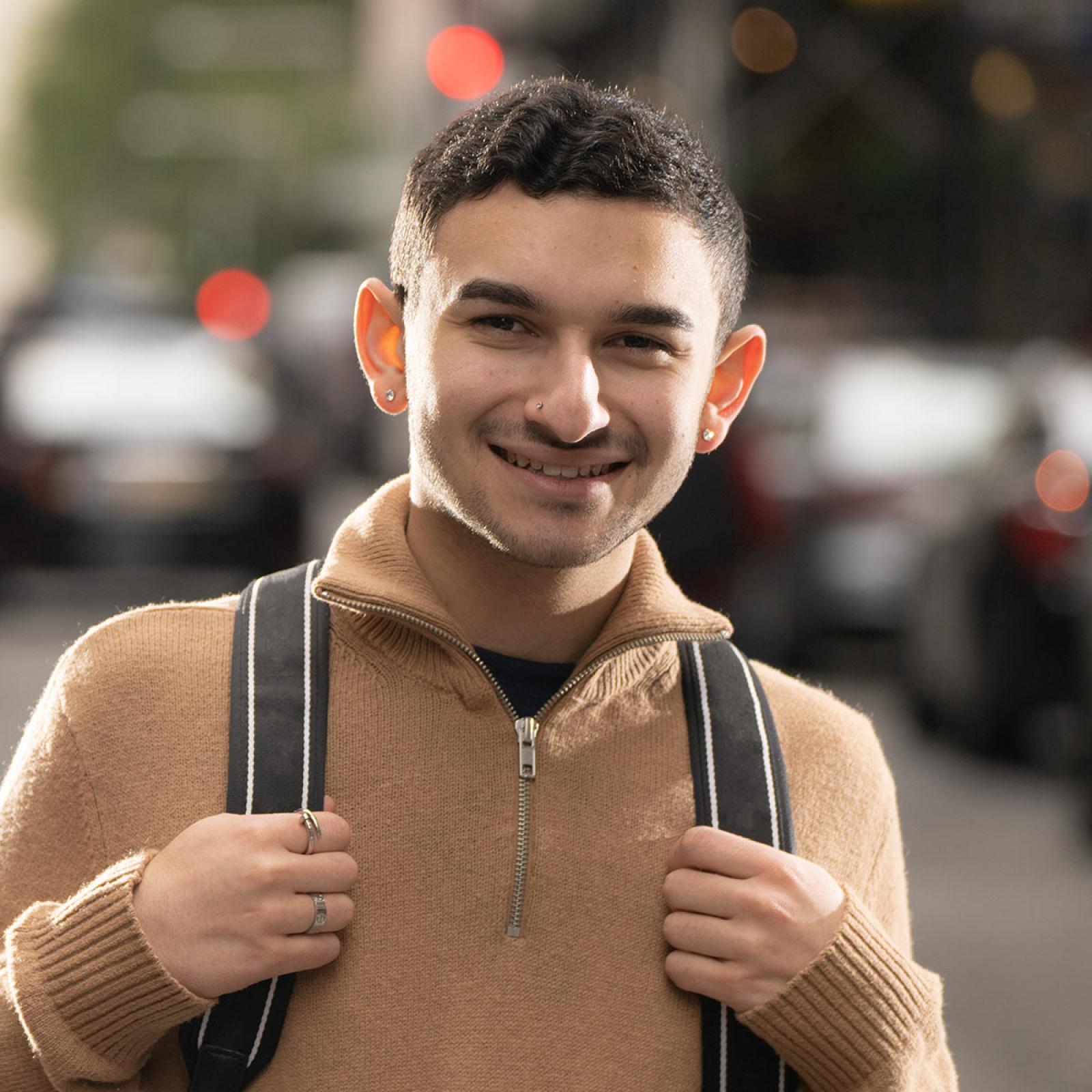 Pace University student smiling at the camera. 