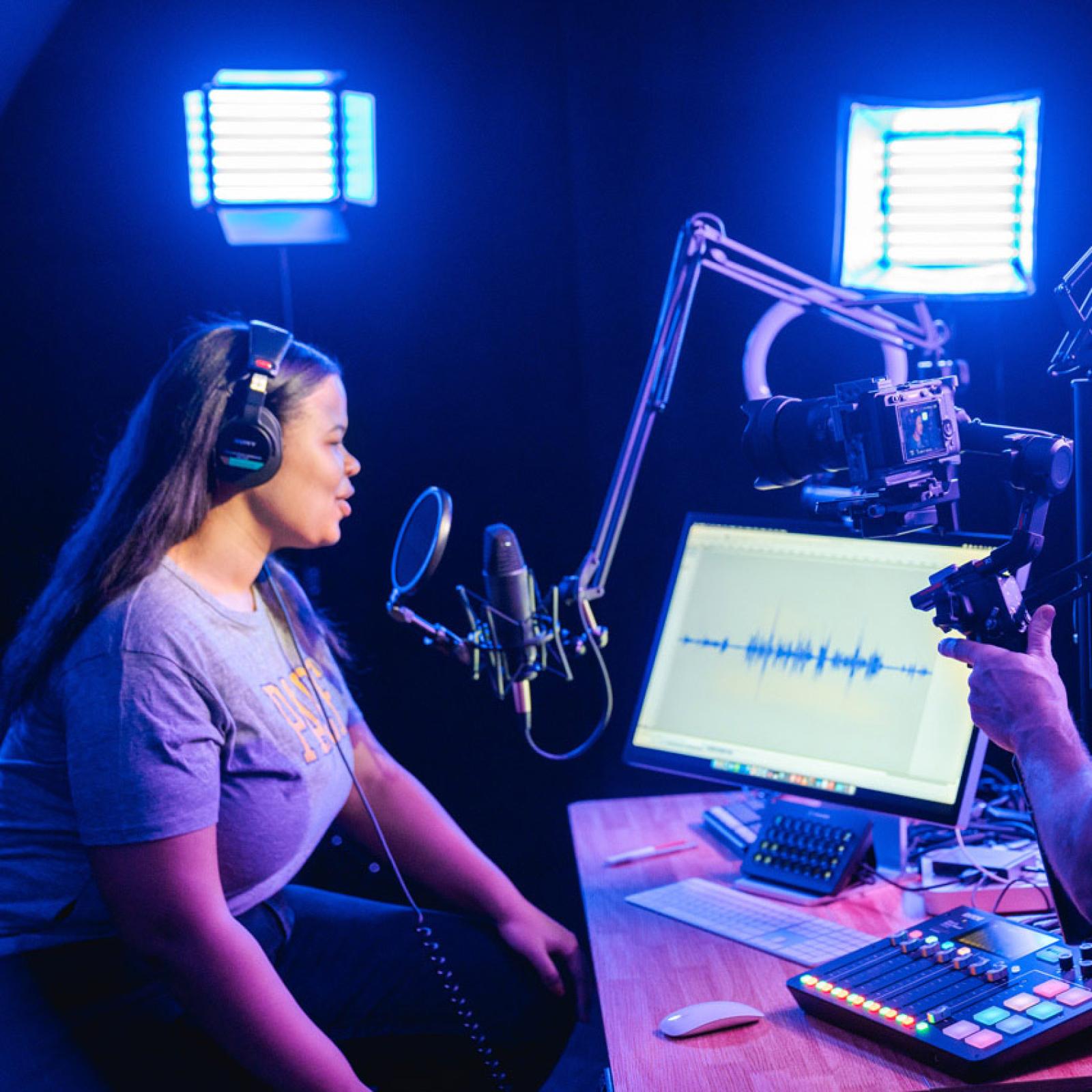 Sands College of Performing Arts student recording a voice over in the studio.