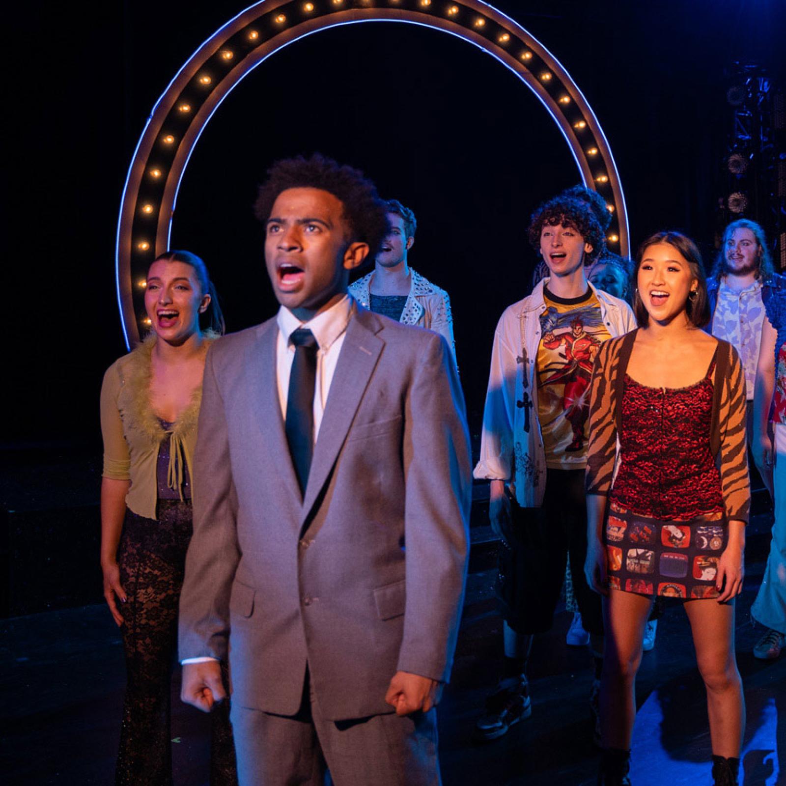 Sands College of Performing Arts students performing on stage.