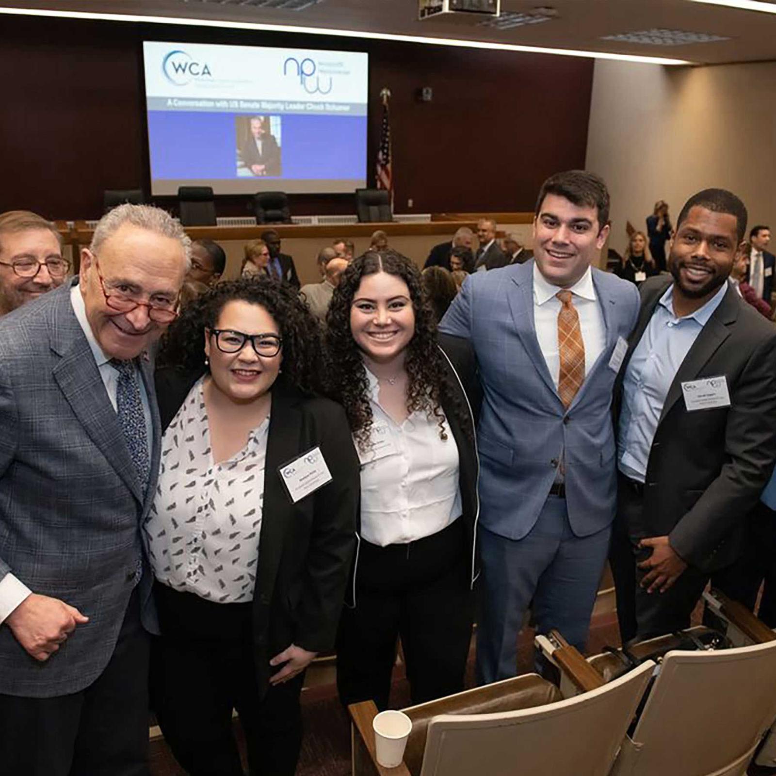 Senator Schumer picture with Law Students and Alumni