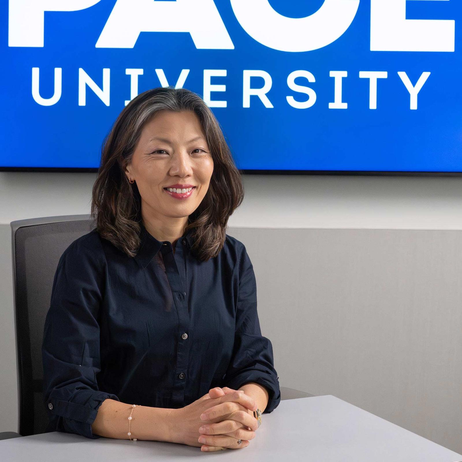 Lubin accounting professor Myo Jung Cho in a classroom at One Pace Plaza, New York City Campus