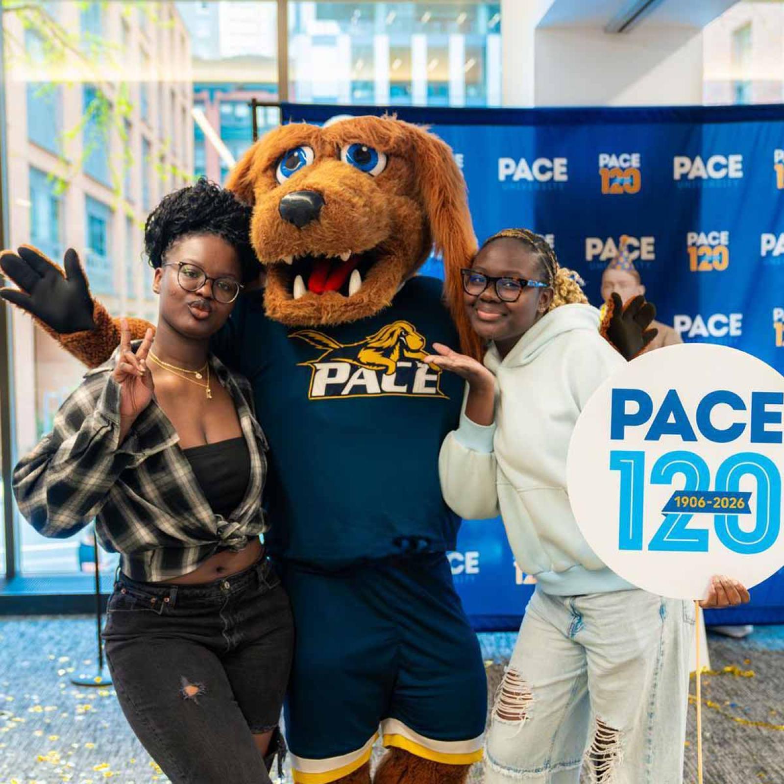 Students with T-Bone celebrating the 120th anniversary.