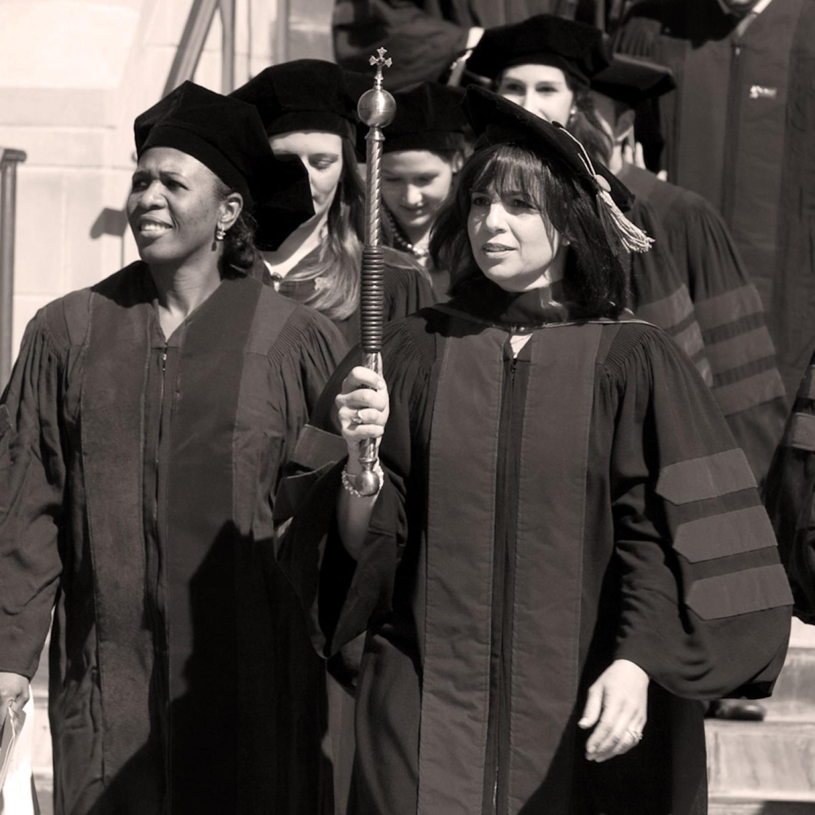 Angie D'Agostino leading students during commencement circa 2020