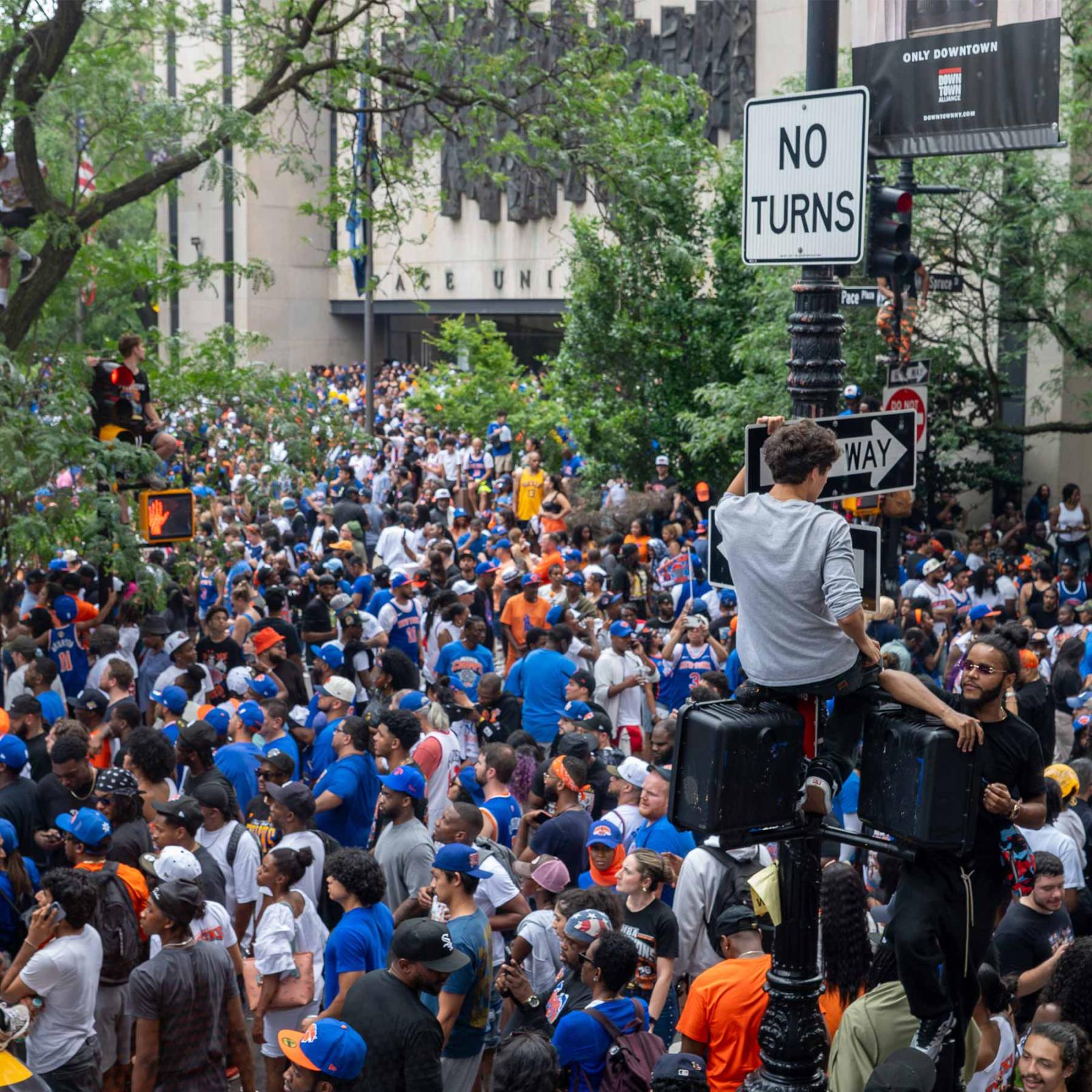 Crowds of people in front of One Pace Plaza for the NY Knicks Ticker Tape parade.
