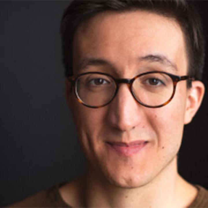 Portrait of Justin Cimino with a black background
