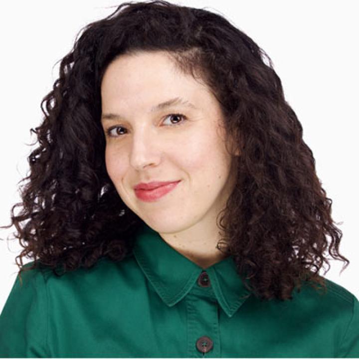 Portrait of Lindsey Hope Pearlman wearing a green buttoned-up shirt