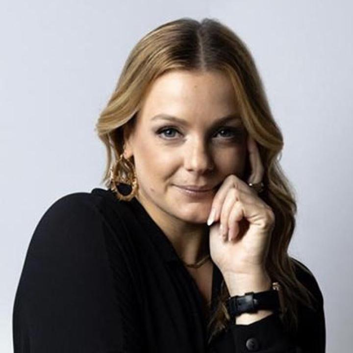 Portrait of Rachel Dolan wearing a black blouse